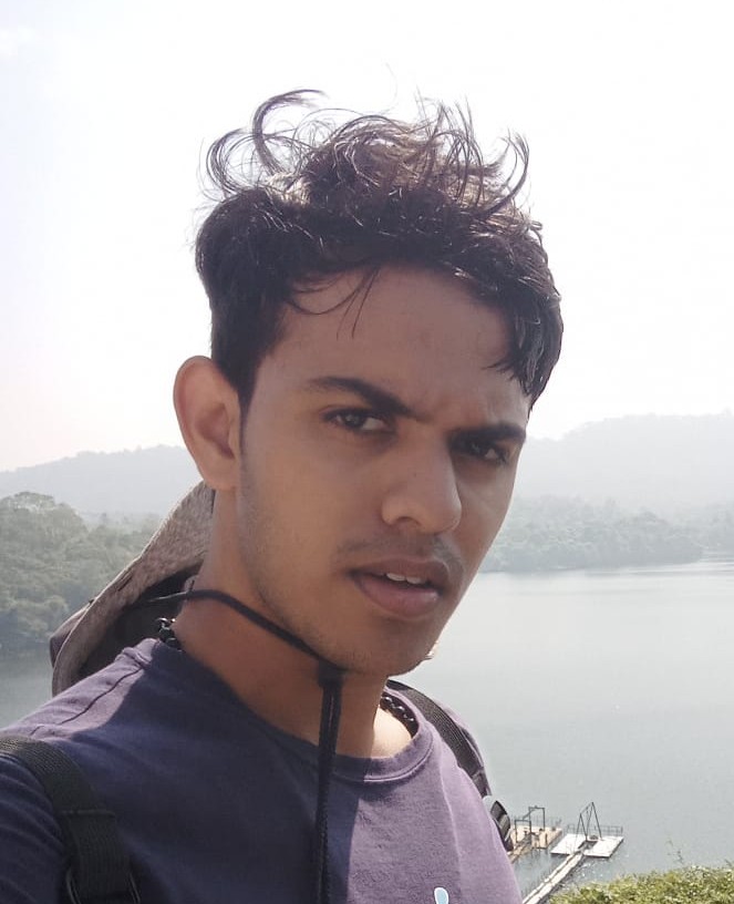 portait of John Erinjery